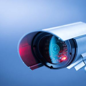Security, CCTV camera for office building at night in London. Security, CCTV camera for office building at night in London.
